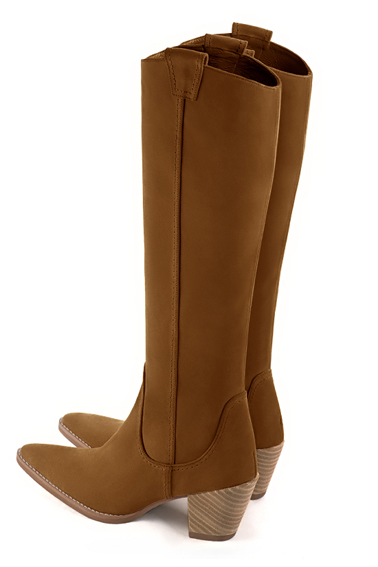 French elegance and refinement for these caramel brown cowboy boots, 
                available in many subtle leather and colour combinations. Pretty boot adjustable to your measurements in height and width
Customizable or not, in your materials and colors.
Its side zip and her round cutout will leave you very comfortable.
Perfect on jeans, shorts or bohemian chic dress. 
                Made to measure. Especially suited to thin or thick calves.
                Matching clutches for parties, ceremonies and weddings.   
                You can customize these knee-high boots to perfectly match your tastes or needs, and have a unique model.  
                Choice of leathers, colours, knots and heels. 
                Wide range of materials and shades carefully chosen.  
                Rich collection of flat, low, mid and high heels.  
                Small and large shoe sizes - Florence KOOIJMAN